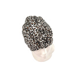 Leopard print headscarf on a mannequin head against a white background