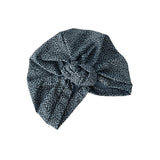 Leopard print headscarf on a white background