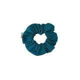 Blue scrunchie on a white background
