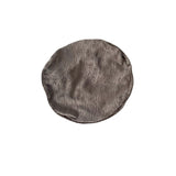 Round textured gray object on a white background