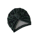 Green striped headscarf with a gray interior on a white background
