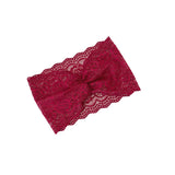 Red lace headband on a white background