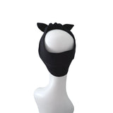 A black fabric headband with two pointed cat ears on top, displayed on a white mannequin head against a plain white background.