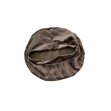 Brown satin hair turban on a white background