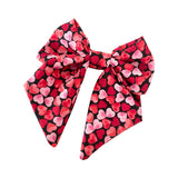 Oversized heart print Valentines Day bow clip