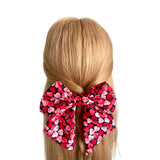 Oversized heart print Valentines Day bow clip