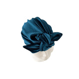 Blue headscarf on a white mannequin head with a white background