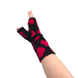 Black fingerless arm warmers with red hearts