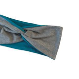 Gray and teal headband on a white background