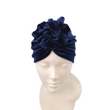 Navy blue headscarf with floral design on a mannequin head against a white background ireland