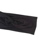 Black headband on a white background