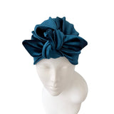 Blue headband on a mannequin head against a white background ireland