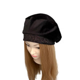 Black beanie with glittering band on a mannequin head with brown hair against a white background ireland