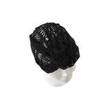 Black round foam pad on a white background
