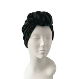 Black headband with knot on a mannequin head against a white background