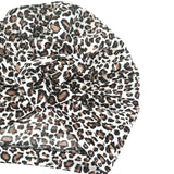Leopard print headscarf on a white background