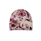 Floral patterned beanie on a white background