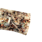 Camouflage-patterned fabric on a white background