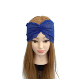 Blue lace headband on a mannequin head with brown hair against a white background