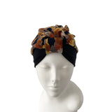 Turban with a pattern on a mannequin head against a white background