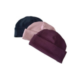 Three knit beanie hats in black, beige, and purple on a white background
