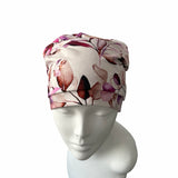 Floral patterned beanie on a mannequin head against a white background
