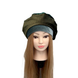 Mannequin head with two hats on a white background