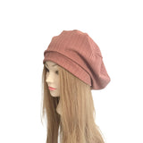 pink knit beret  headband on a white background