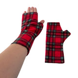 Red plaid fingerless gloves on a white background