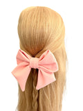 Oversized salmon pink fabric hair bow barrette clip 