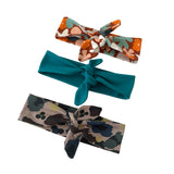 Three colorful hair bands on a white background