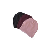Three knit beanie hats in black, burgundy, and pink on a white background