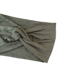 Folded gray fabric headband on a white background