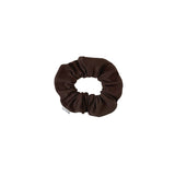 Brown scrunchie on a white background