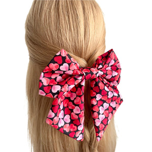 Oversized heart print Valentines Day bow clip