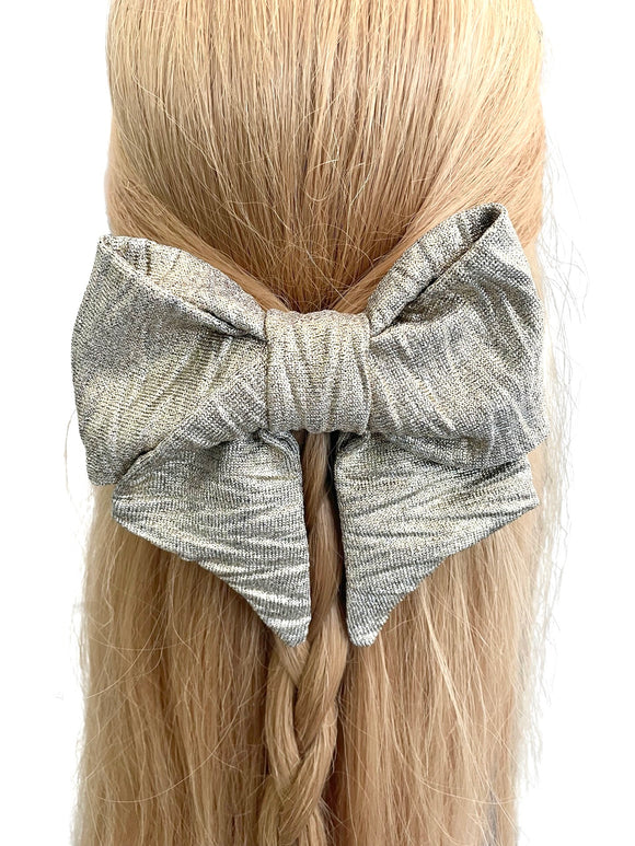 Gold zig zag patterned oversized hair bow 