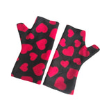 Black fingerless arm warmers with red hearts