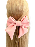 Oversized salmon pink fabric hair bow barrette clip 