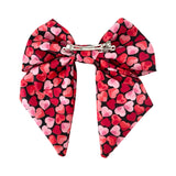 Oversized heart print Valentines Day bow clip