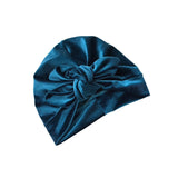 Blue turban with a bow on a white background