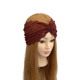 Brown lace headband on a mannequin head with long brown hair against a white background