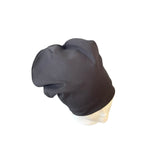 Dark gray beanie on a mannequin head against a white background