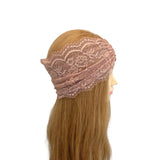 Lace headband on a mannequin head with blonde hair against a white background