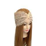 Lace headband on a mannequin head with long brown hair against a white background
