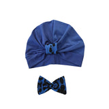 Blue turban with a matching bow on a white background