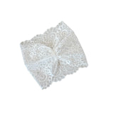 White lace fabric on a white background
