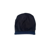 Black beanie with blue rim on a white background