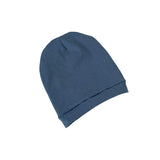 Blue beanie hat on a white background