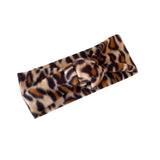Leopard print headband on a white background