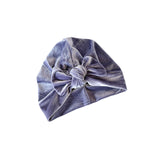 Blue velvet turban on a white background